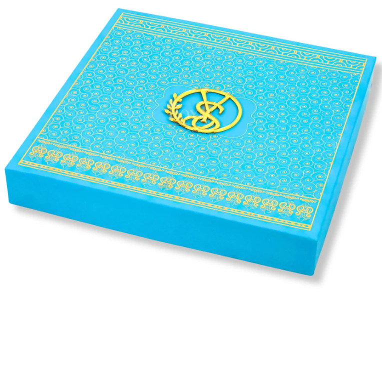 Top view of Premium Wedding Favor Box filled with traditional bhaji and sweets